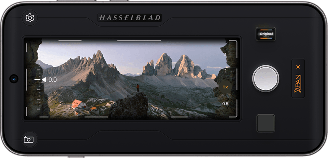 Phone screen displaying Hasselblad XPAN Mode interface framing a mountain landscape