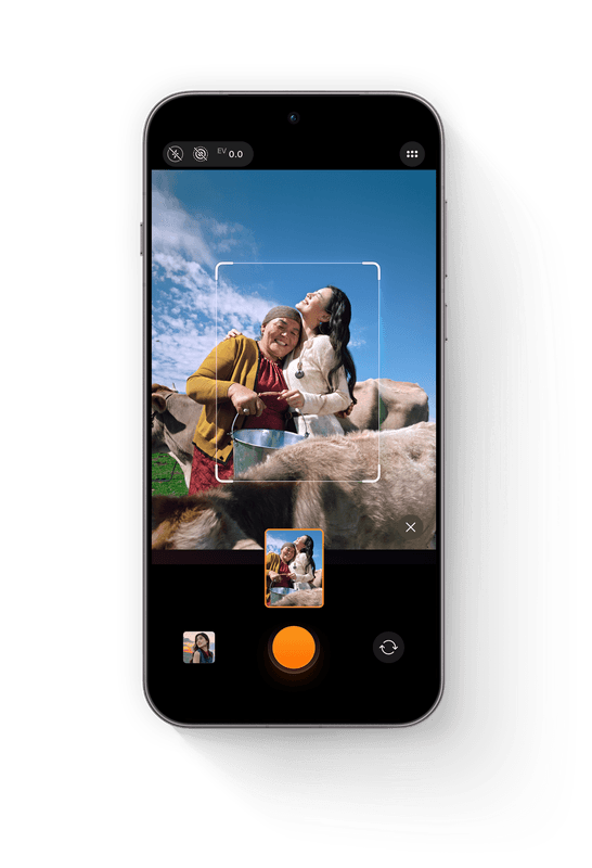 Phone screen demonstrating LUMO Framing auto-composition on a scenic sunset