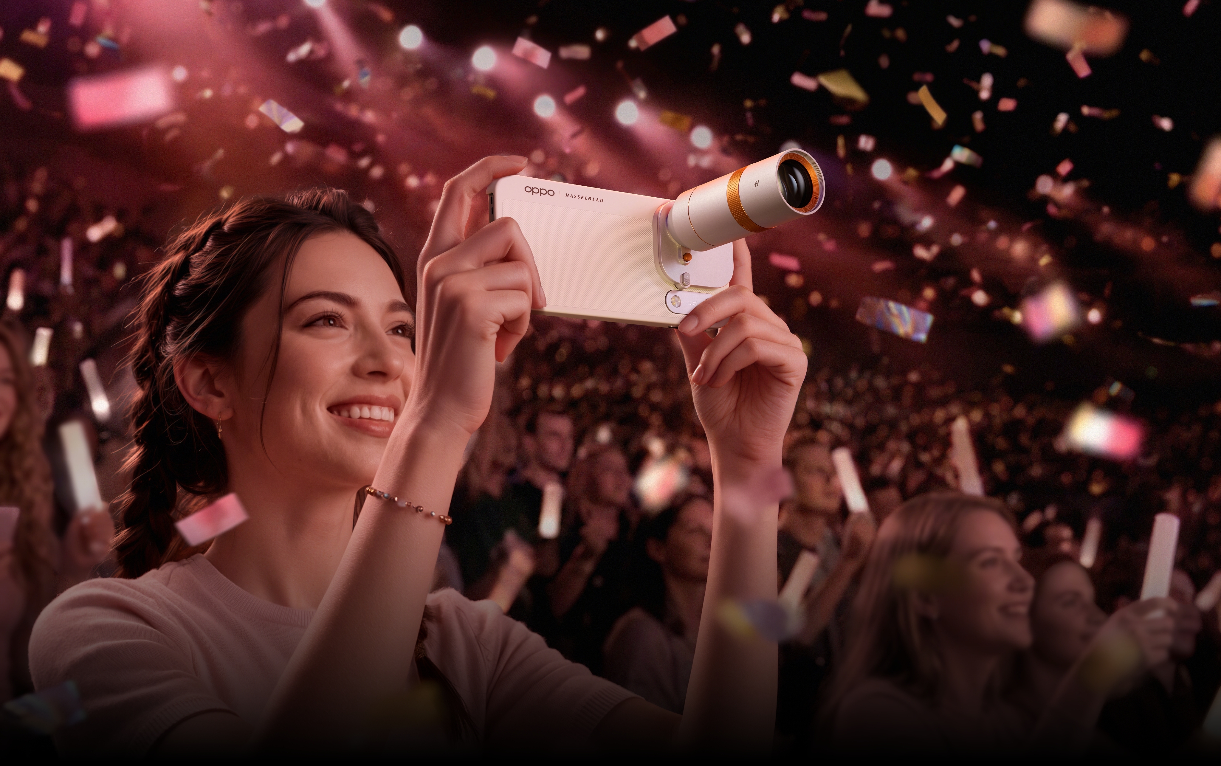 Concertgoer using OPPO Hasselblad Teleconverter to get front-row close-ups at a live show