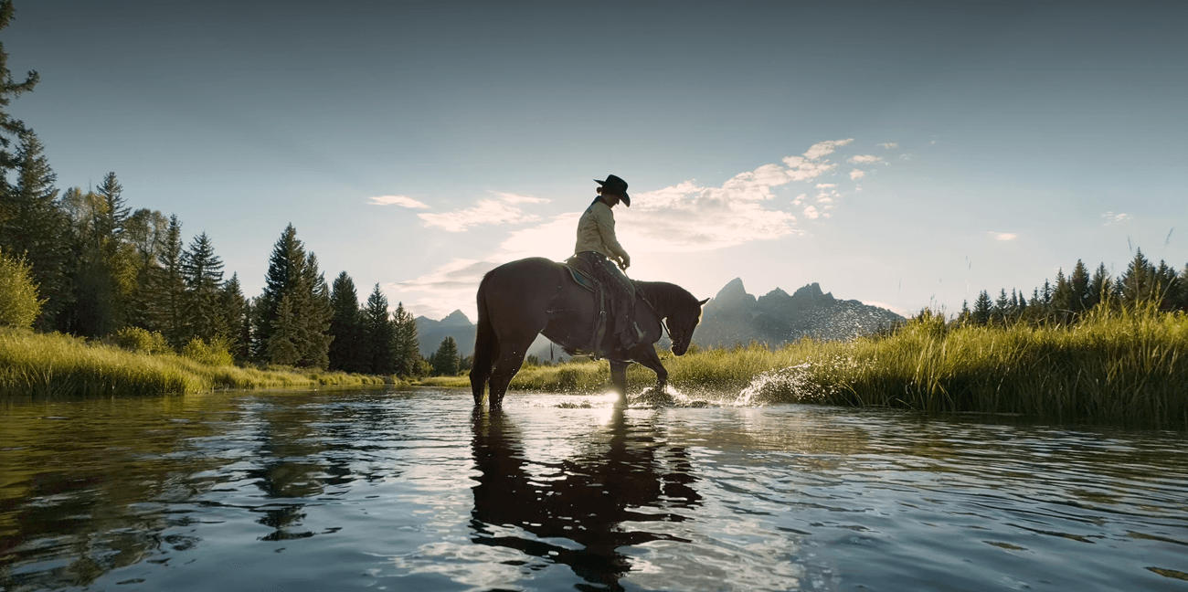 Cowboy on horseback in rich backlight , showing video quality of Find X10 Pro Max
