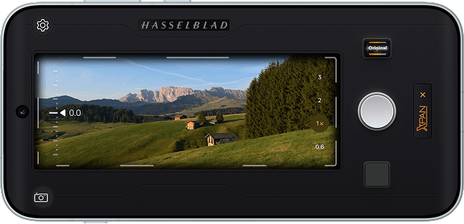 Phone screen displaying Hasselblad XPAN Mode interface framing a mountain landscape