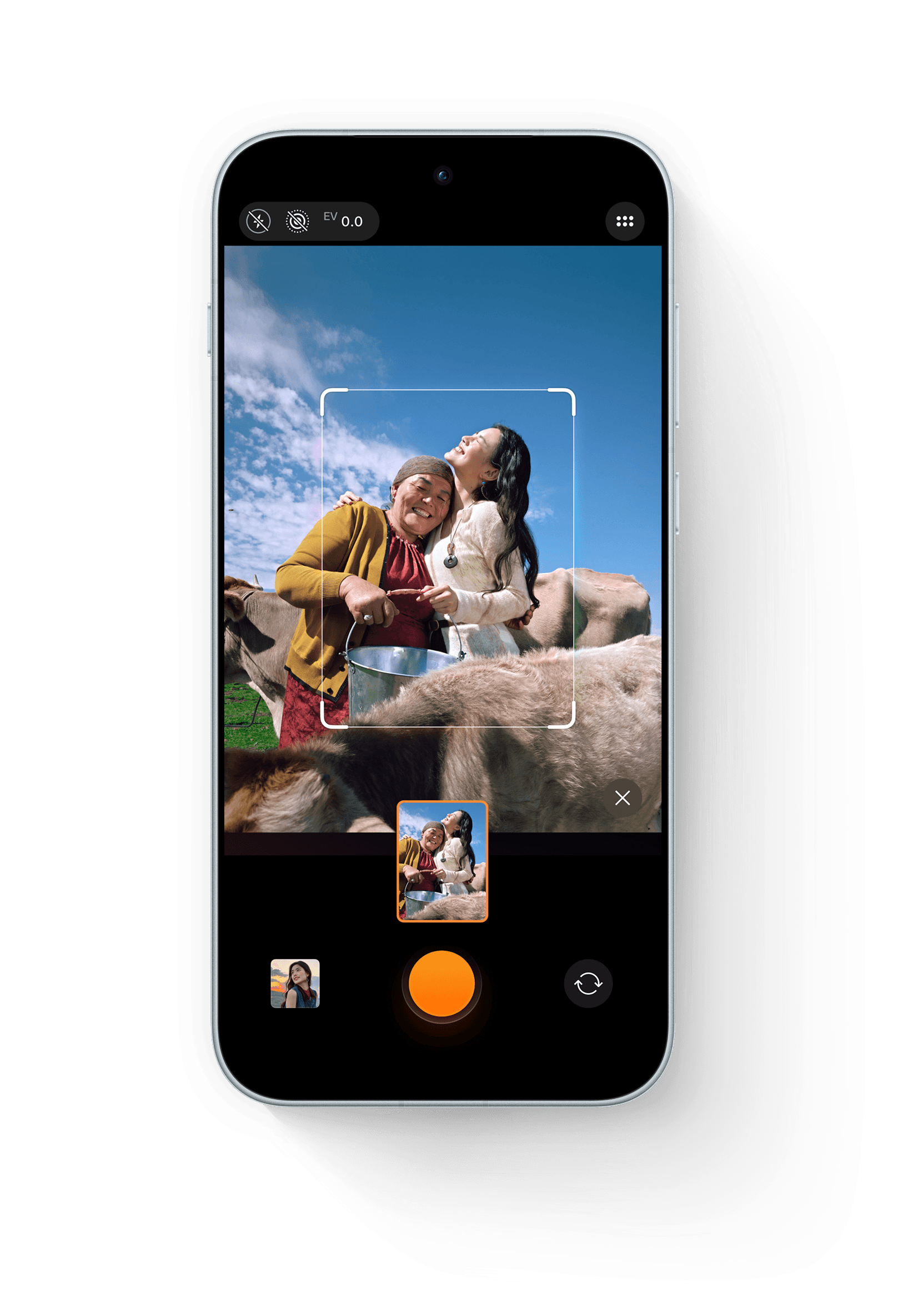 Phone screen demonstrating LUMO Framing auto-composition on a scenic sunset