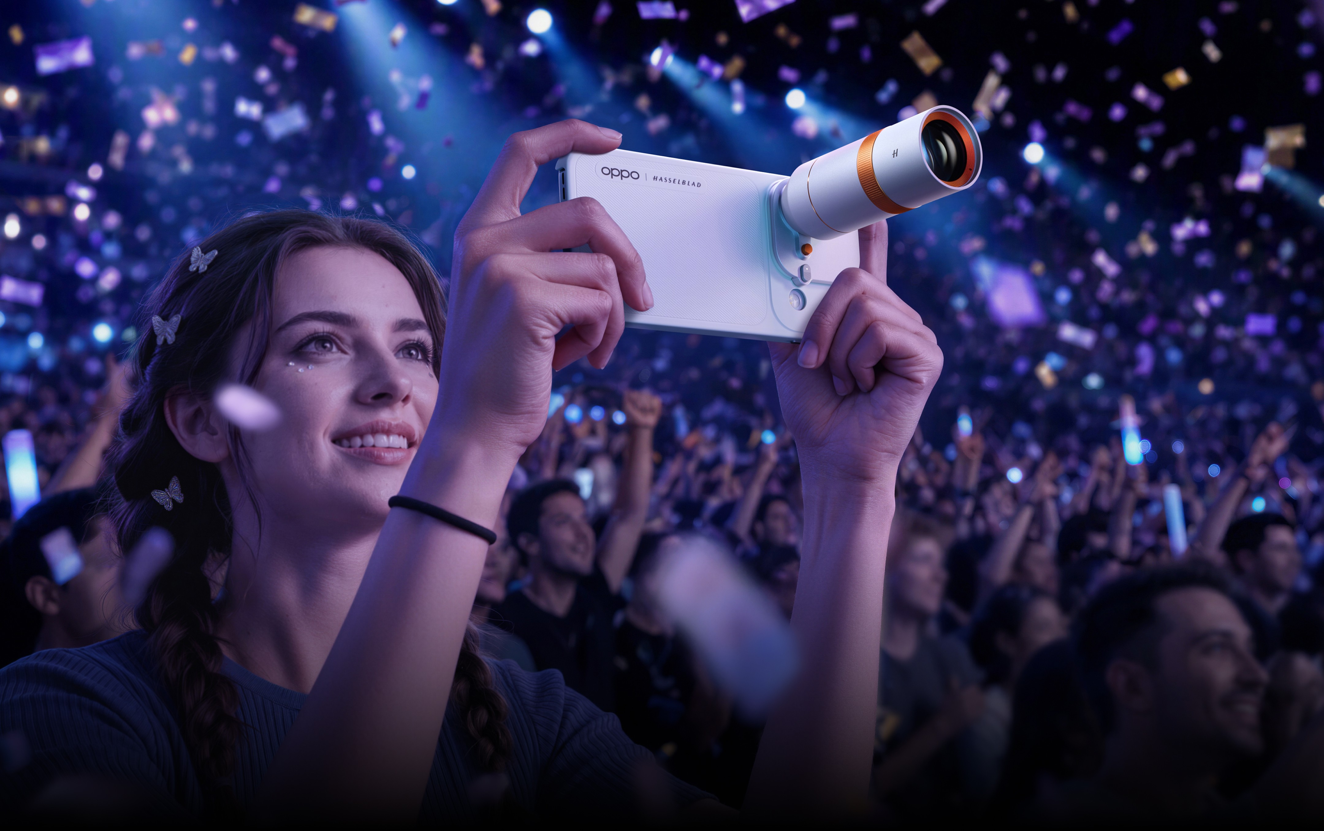Uczestnik koncertu używający telekonwertera OPPO Hasselblad do robienia zbliżeń jak z pierwszego rzędu podczas występu na żywo