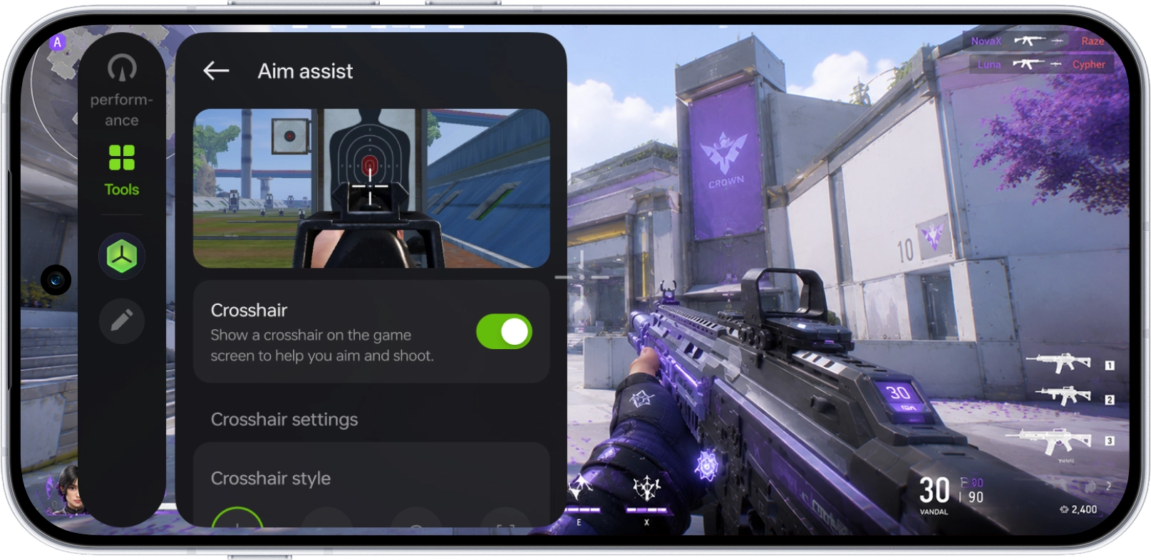 A smartphone screenshot showing an active white crosshair overlay generated by the Game Master Toolkit in an FPS game